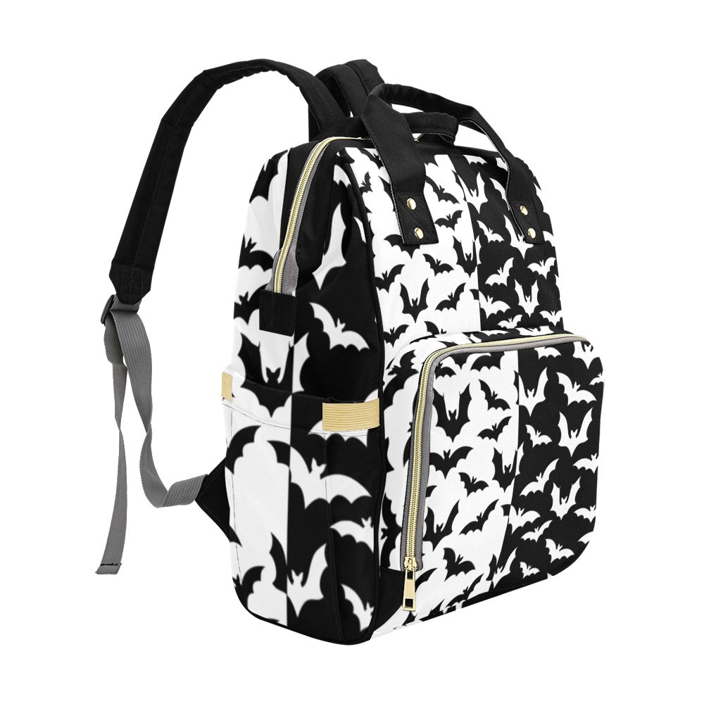 Black & White Bats Backpack left three-quarter view showing side pocket and front zipper