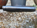 Close-up of a PU leather wallet bottom edge