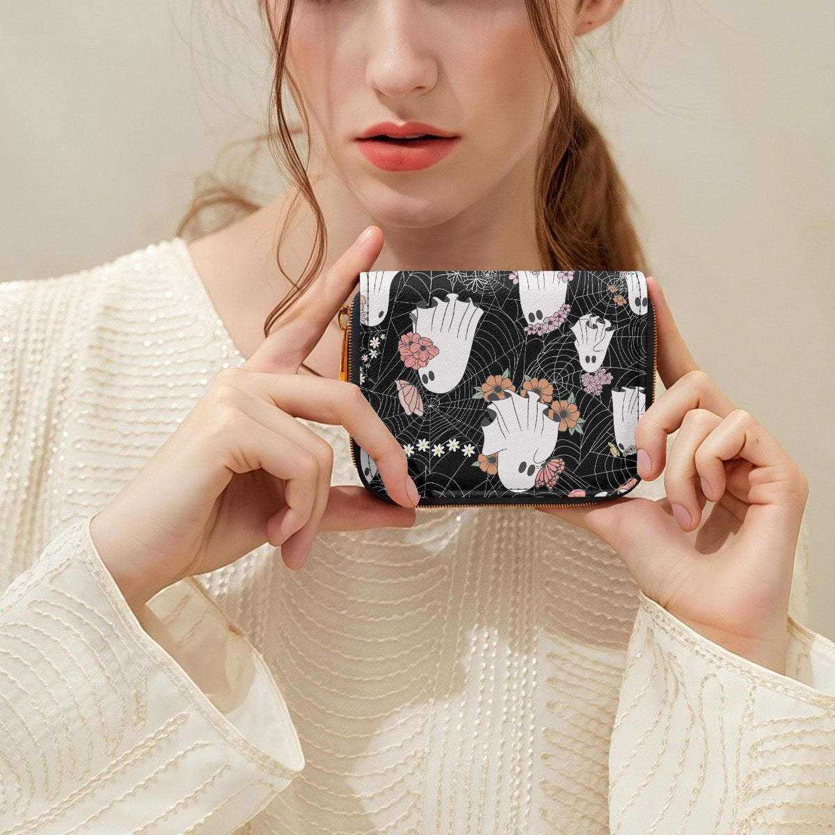 Floral Ghost Web Bifold Zipper Wallet held in hands