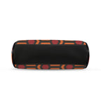 Underside of kisslock bag with burnt-orange and red Haunted Hotel geometric print and black bottom panel