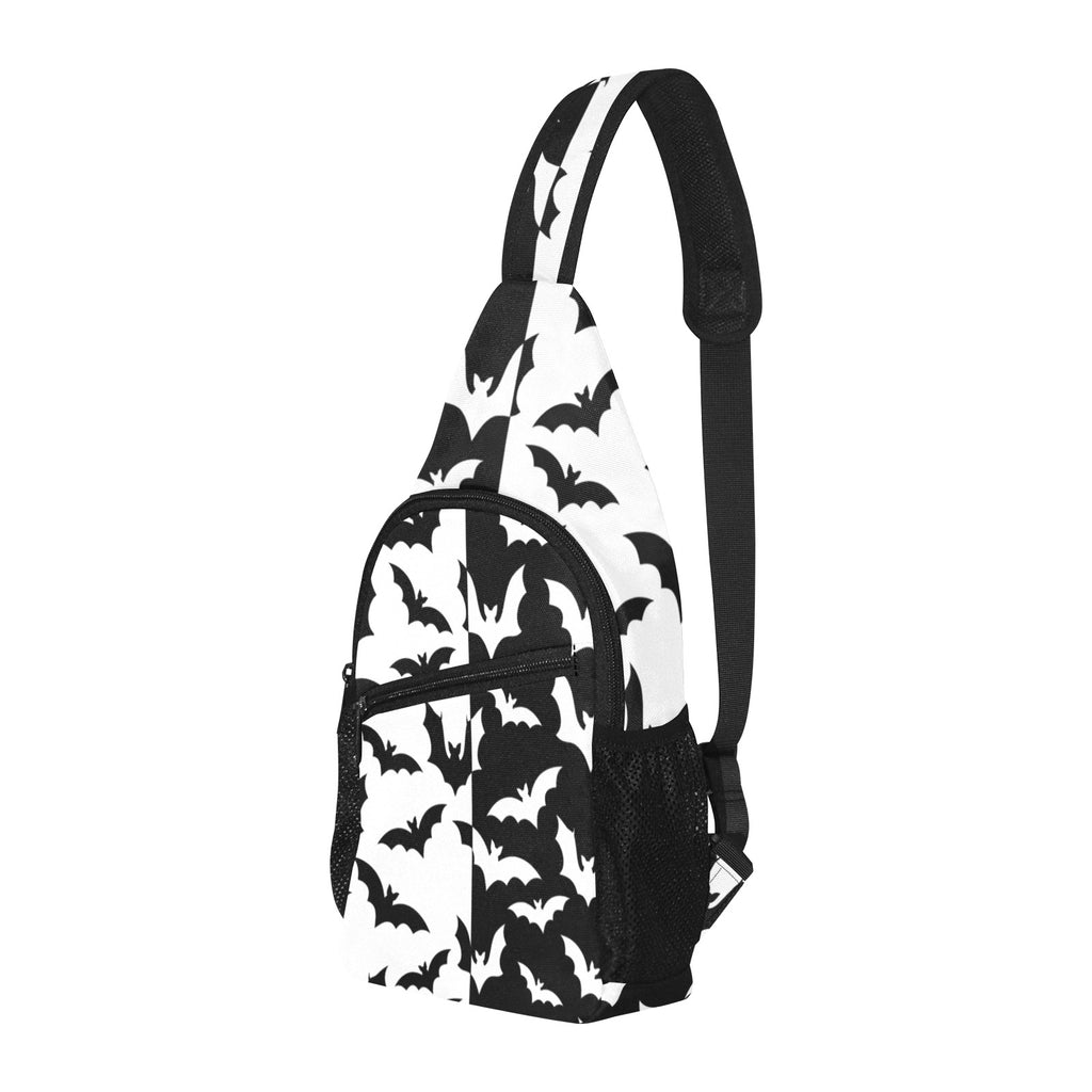 Three-quarter view of chest bag with black and white bat pattern, front pocket and side mesh