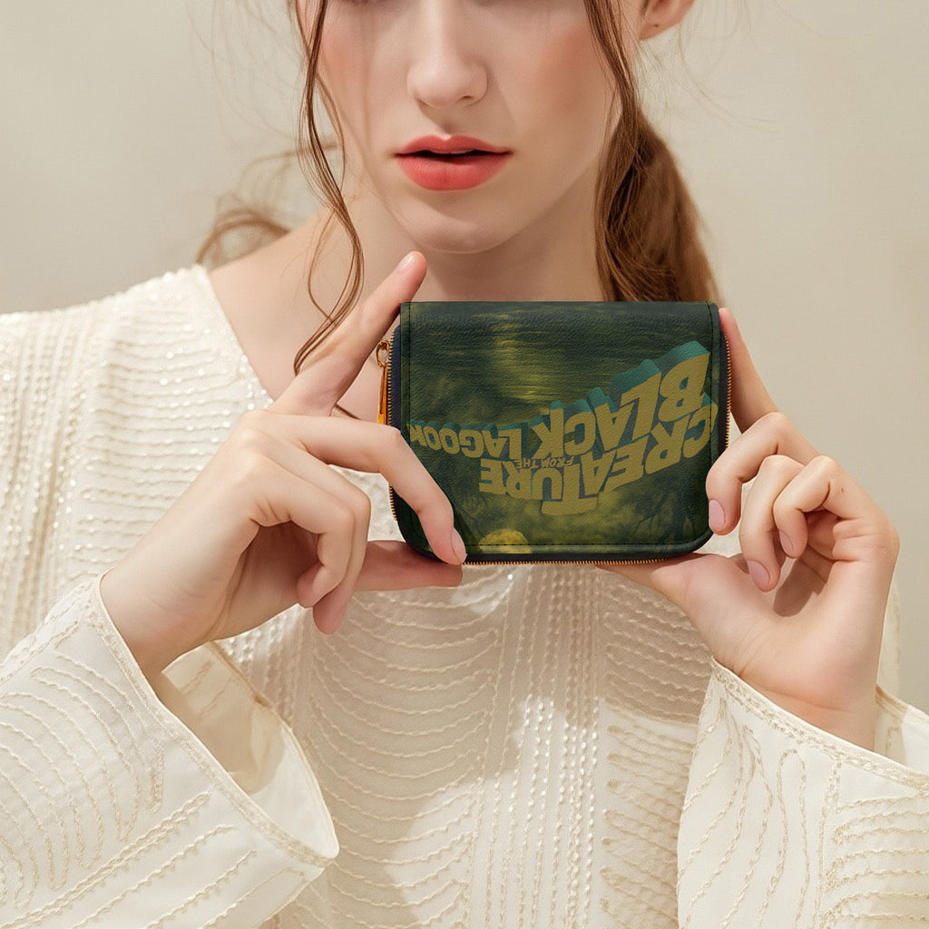 Black Lagoon Creature Bifold Zipper Wallet held in hands