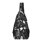 Chest bag with white ghosts and reapers on black, upright view showing zippered front pocket