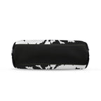 Underside of kisslock bag with black and white bat pattern and black bottom panel