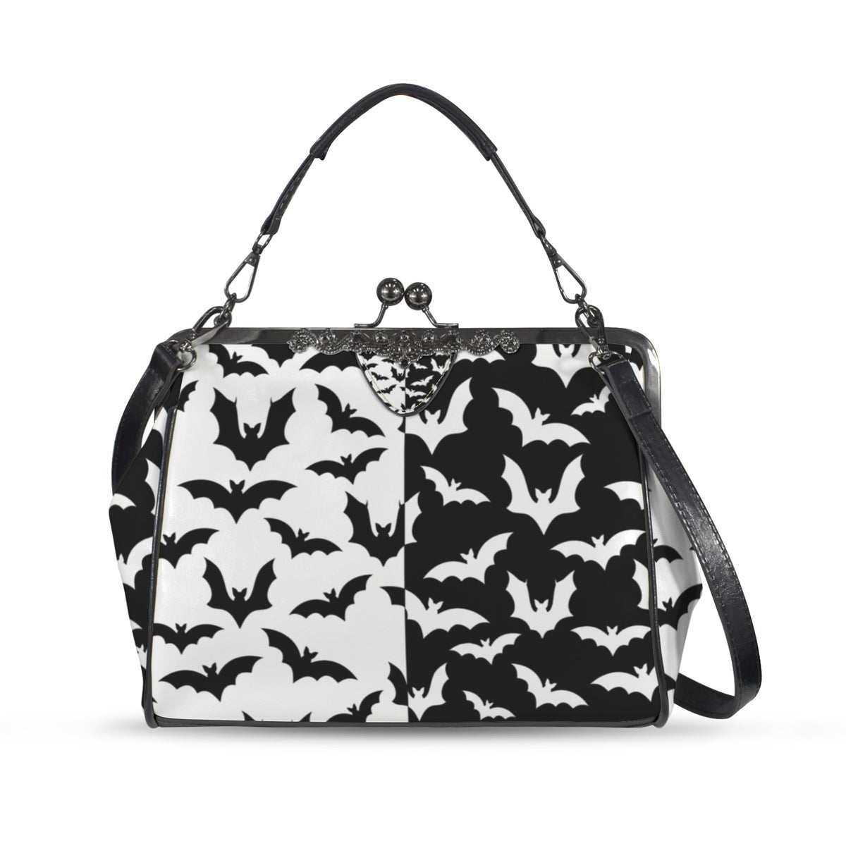 Kisslock crossbody bag with black and white bat pattern, front view with handle and shoulder strap
