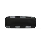 Underside of kisslock bag with black and white checkerboard pattern and black bottom panel