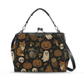 Kisslock crossbody bag with autumn ghosts, pumpkins, and woodland animal print, front view with handle and shoulder strap
