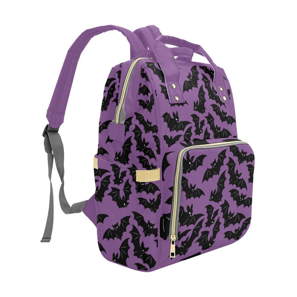 Lavender Bats Backpack left three-quarter view showing side pocket and front zipper