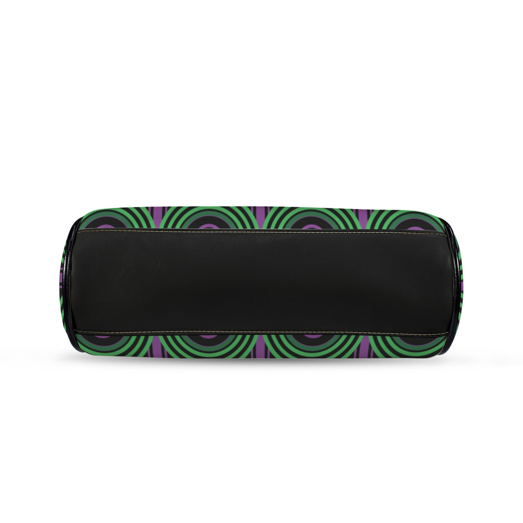 Underside of kisslock bag with green arches and purple keyhole pattern and black bottom panel