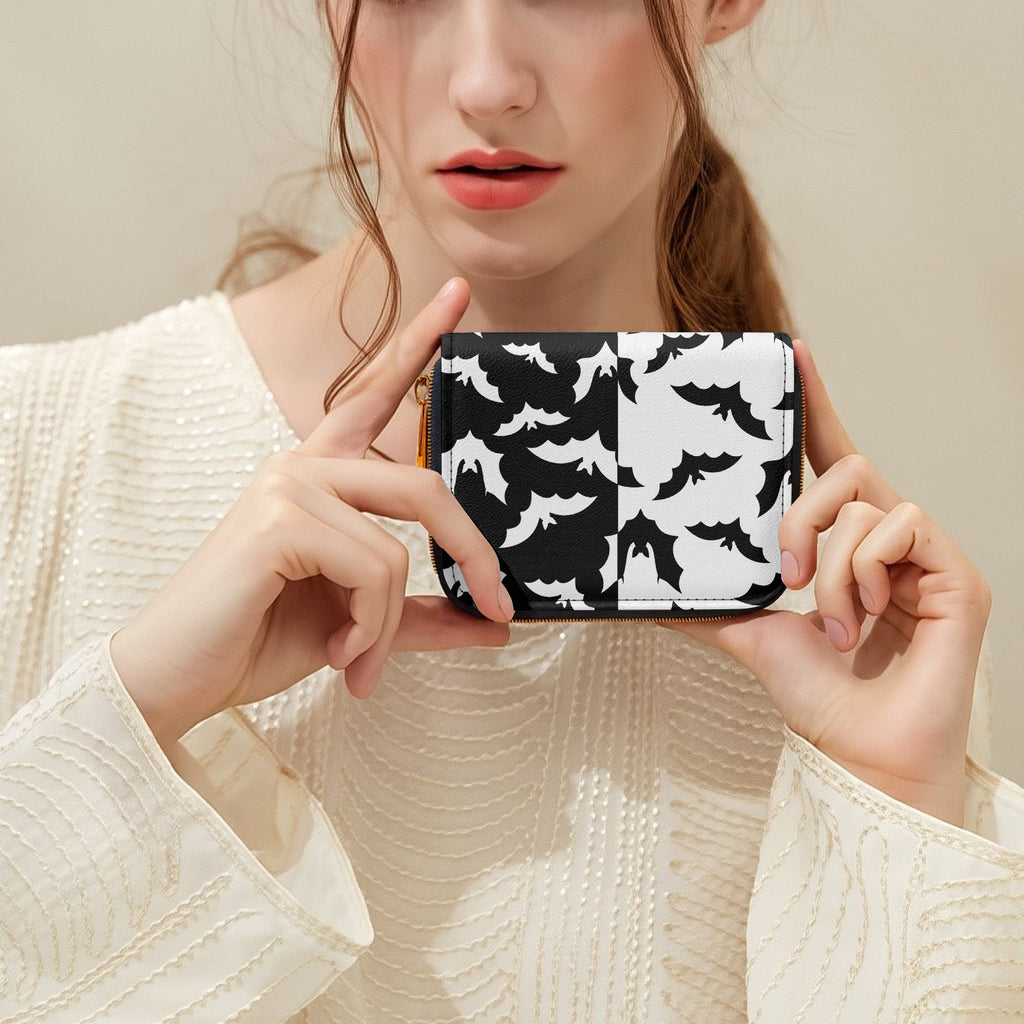 Black & White Bat Swarm Bifold Zipper Wallet held in hands