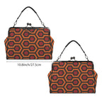 Kisslock bag with burnt-orange and red Haunted Hotel geometric print shown from two broad sides beside a width marker