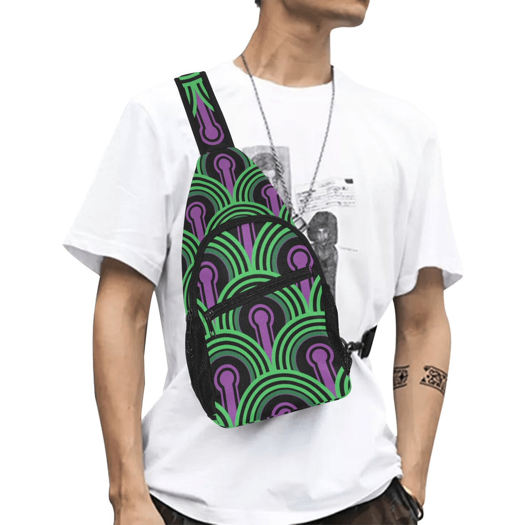 Model wearing crossbody chest bag with green arches and purple keyhole pattern