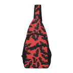 Chest bag with red and black bat pattern, upright view showing zippered front pocket