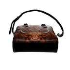Brown Cow Shoulder Handbag bottom view with shoulder strap