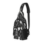 Three-quarter view of chest bag with white ghosts and reapers on black, front pocket and side mesh